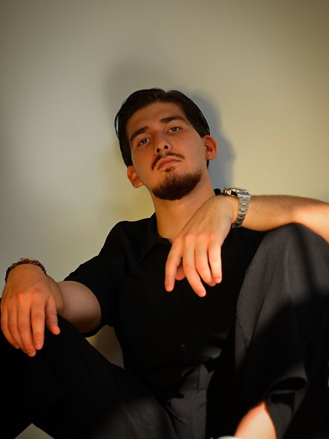Portrait of SEYMEN in a black shirt