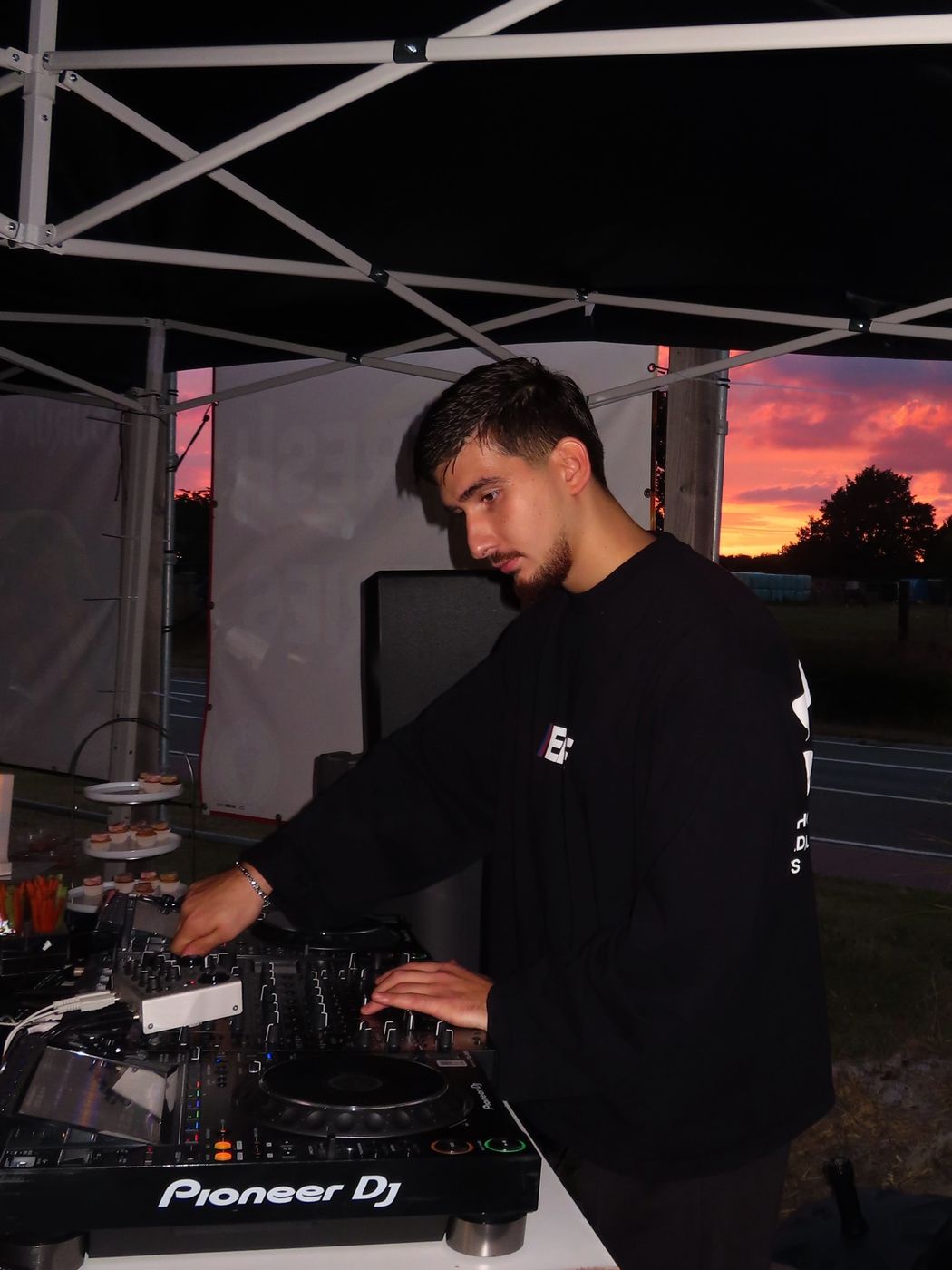 SEYMEN playing an open-air set at sunset